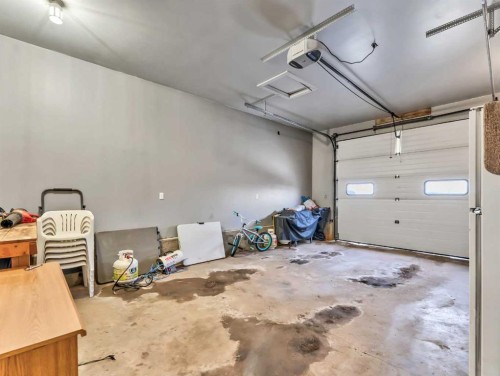 12002 Range Road 65, Rural Cypress County, AB - Indoor Photo Showing Garage