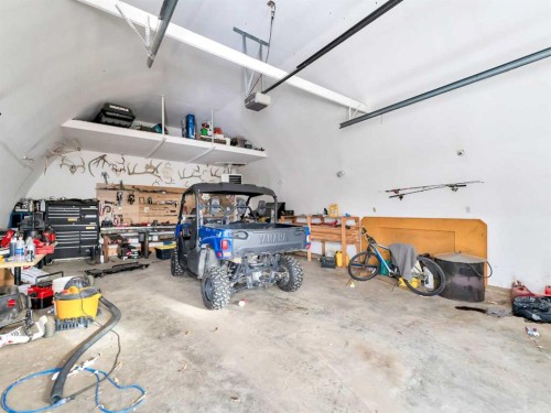 12002 Range Road 65, Rural Cypress County, AB - Indoor Photo Showing Garage