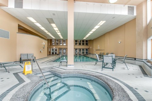 429-1182 Southview Drive Se, Medicine Hat, AB - Indoor Photo Showing Other Room With In Ground Pool