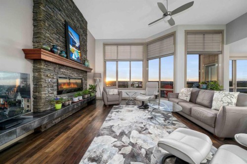 30 Palisades Mews Ne, Medicine Hat, AB - Indoor Photo Showing Living Room With Fireplace