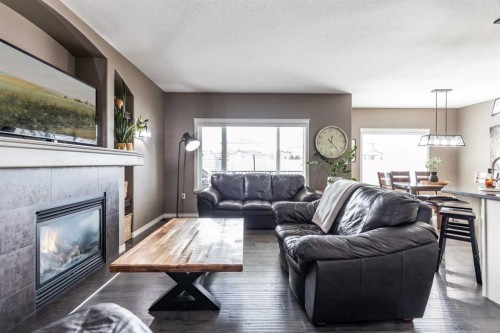 324 Somerside Crescent Se, Medicine Hat, AB - Indoor Photo Showing Living Room With Fireplace