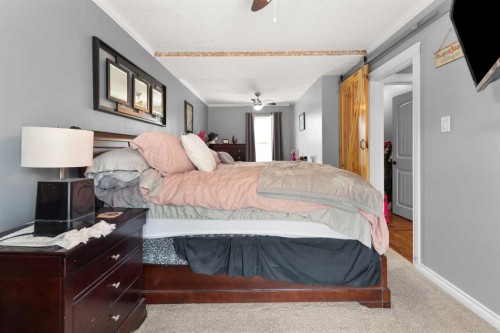 721 4 Avenue, Dunmore, AB - Indoor Photo Showing Bedroom