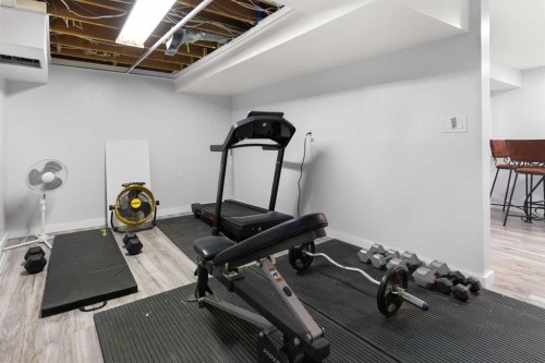 721 4 Avenue, Dunmore, AB - Indoor Photo Showing Gym Room