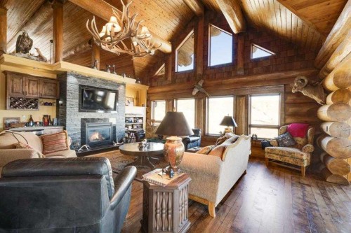21468 Range Road 13, Bindloss, AB - Indoor Photo Showing Living Room With Fireplace