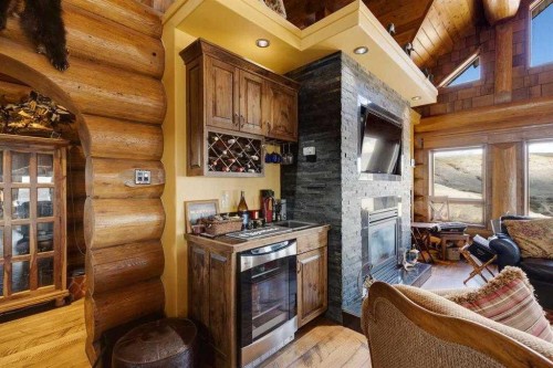 21468 Range Road 13, Bindloss, AB - Indoor Photo Showing Living Room With Fireplace