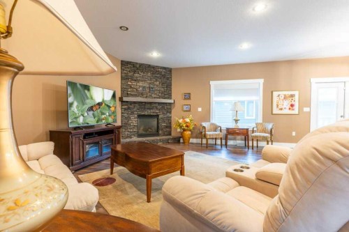 208 Westview Crescent West, Bow Island, AB - Indoor Photo Showing Living Room With Fireplace