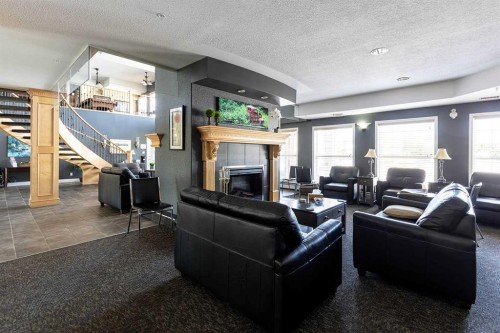 307-29 River Ridge Drive Nw, Medicine Hat, AB - Indoor Photo Showing Living Room With Fireplace