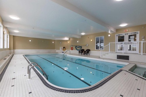 307-29 River Ridge Drive Nw, Medicine Hat, AB - Indoor Photo Showing Other Room With In Ground Pool