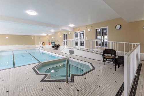 307-29 River Ridge Drive Nw, Medicine Hat, AB - Indoor Photo Showing Other Room With In Ground Pool