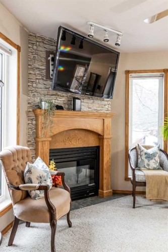 512 11 Street, Dunmore, AB - Indoor Photo Showing Living Room With Fireplace