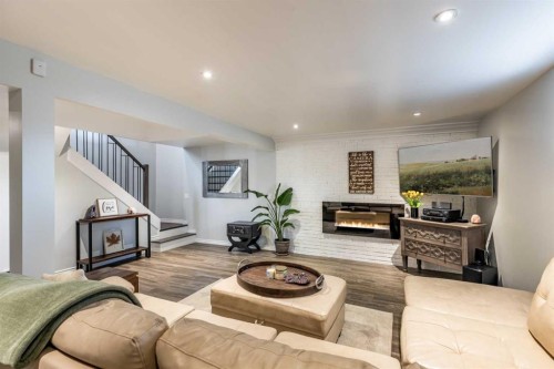 2666 16 Avenue Se, Medicine Hat, AB - Indoor Photo Showing Living Room With Fireplace