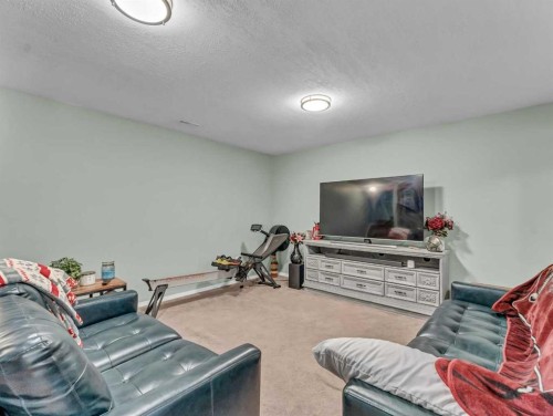 135 Sage Close Se, Medicine Hat, AB - Indoor Photo Showing Gym Room