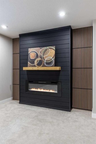 529 Somerside View Se, Medicine Hat, AB - Indoor Photo Showing Other Room With Fireplace