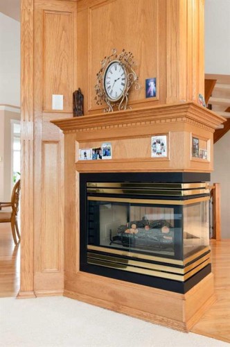 22 Turner Crescent Se, Medicine Hat, AB - Indoor Photo Showing Living Room With Fireplace