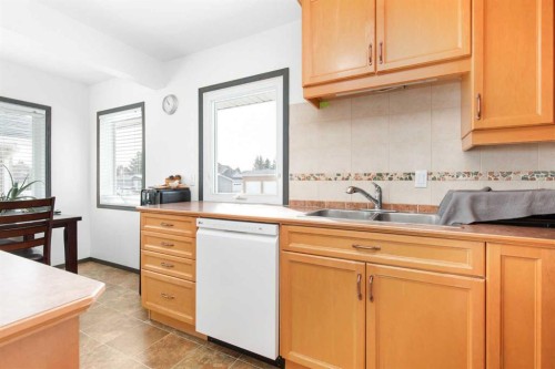 803 2 Avenue West, Foremost, AB - Indoor Photo Showing Kitchen With Double Sink