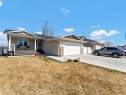 32 Spruce Close Se, Medicine Hat, AB  - Outdoor With Deck Patio Veranda With Facade 