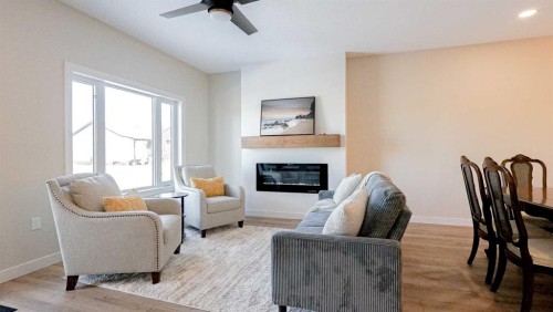 173 Parkview Crescent West, Bow Island, AB - Indoor Photo Showing Living Room With Fireplace