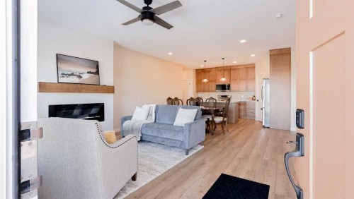 173 Parkview Crescent West, Bow Island, AB - Indoor Photo Showing Living Room With Fireplace