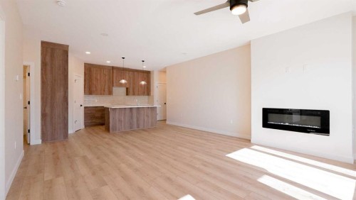 240 Parkview Lane West, Bow Island, AB - Indoor With Fireplace