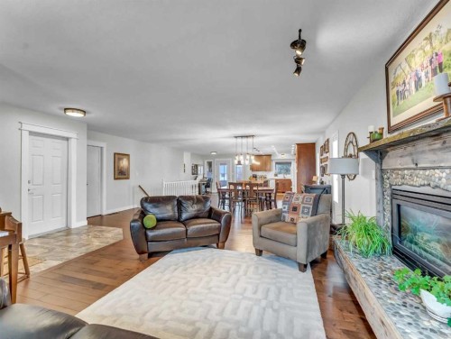 14 Smith Close Se, Medicine Hat, AB - Indoor Photo Showing Living Room With Fireplace