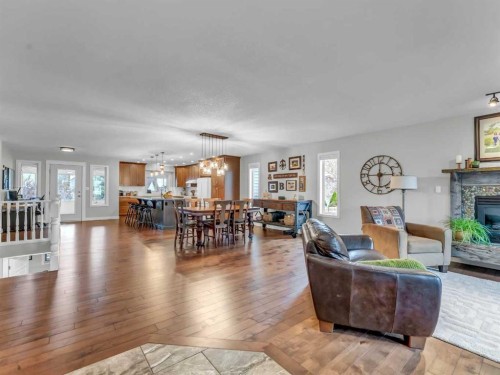 14 Smith Close Se, Medicine Hat, AB - Indoor Photo Showing Living Room With Fireplace