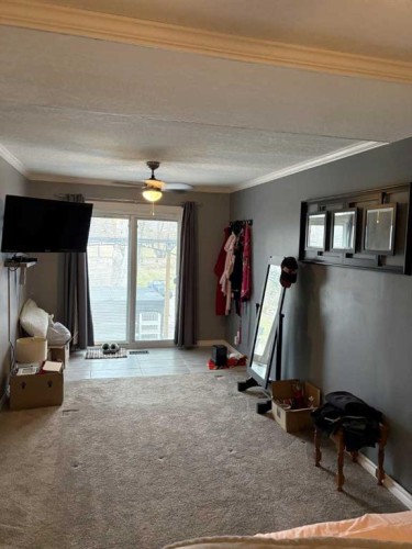 721 4 Avenue, Dunmore, AB - Indoor Photo Showing Gym Room