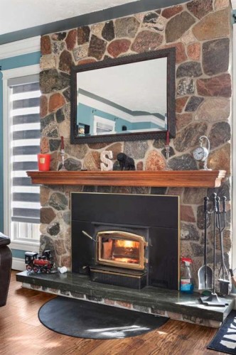 721 4 Avenue, Dunmore, AB - Indoor Photo Showing Living Room With Fireplace