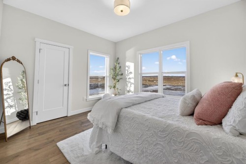 33080 Range Road 61, Rural Mountain View County, AB - Indoor Photo Showing Bedroom
