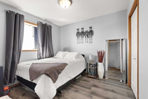 241 Upland Boulevard West, Brooks, AB - Indoor Photo Showing Bedroom