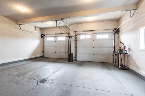 207 Hamptons Way Se, Medicine Hat, AB - Indoor Photo Showing Garage