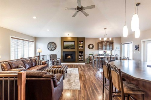 207 Hamptons Way Se, Medicine Hat, AB - Indoor Photo Showing Other Room With Fireplace