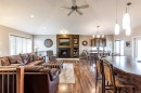 207 Hamptons Way Se, Medicine Hat, AB  - Indoor Photo Showing Other Room With Fireplace 
