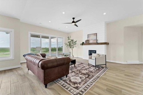 34-12320 Range Road 72, Rural Cypress County, AB - Indoor Photo Showing Living Room With Fireplace