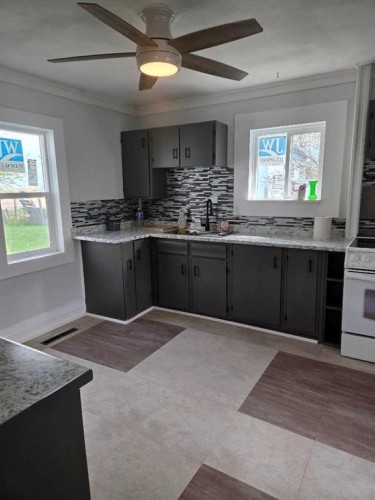 206 1 Avenue East, Foremost, AB - Indoor Photo Showing Kitchen With Double Sink