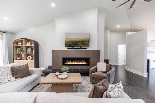 119 Perry Crescent Ne, Medicine Hat, AB - Indoor Photo Showing Living Room With Fireplace