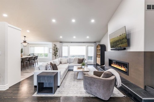 119 Perry Crescent Ne, Medicine Hat, AB - Indoor Photo Showing Living Room With Fireplace