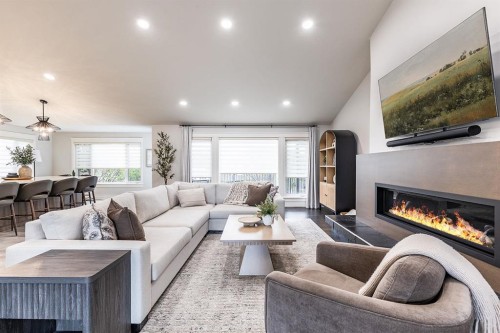 119 Perry Crescent Ne, Medicine Hat, AB - Indoor Photo Showing Living Room With Fireplace