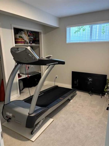 447 Spruce Way Se, Medicine Hat, AB - Indoor Photo Showing Gym Room