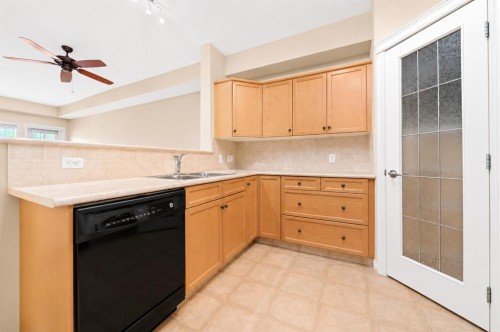 327-201 River Ridge Drive Nw, Medicine Hat, AB - Indoor Photo Showing Kitchen With Double Sink