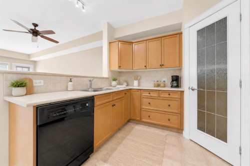 327-201 River Ridge Drive Nw, Medicine Hat, AB - Indoor Photo Showing Kitchen With Double Sink