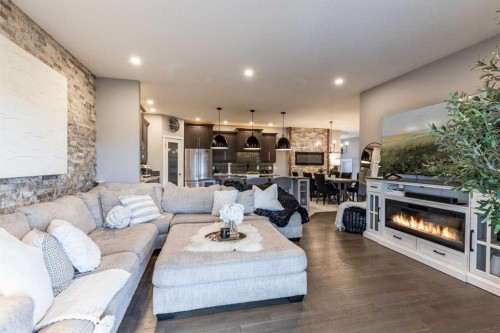 936 Maskell Place Se, Redcliff, AB - Indoor Photo Showing Living Room With Fireplace