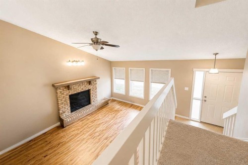 107 Sprague Way Se, Medicine Hat, AB - Indoor With Fireplace