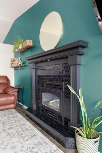 453 Stark Way Se, Medicine Hat, AB - Indoor Photo Showing Other Room With Fireplace