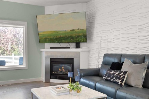 440 Spruce Way Se, Medicine Hat, AB - Indoor Photo Showing Living Room With Fireplace