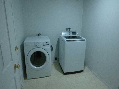 64 Valleyview Drive Sw, Medicine Hat, AB - Indoor Photo Showing Laundry Room