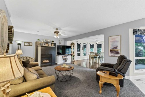 612 Sangster Crescent Sw, Redcliff, AB - Indoor Photo Showing Living Room With Fireplace