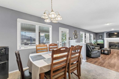 369 Stratton Way Se, Medicine Hat, AB - Indoor Photo Showing Dining Room With Fireplace