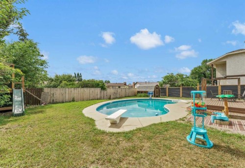 45 Cooper Road Se, Medicine Hat, AB - Outdoor With In Ground Pool With Backyard