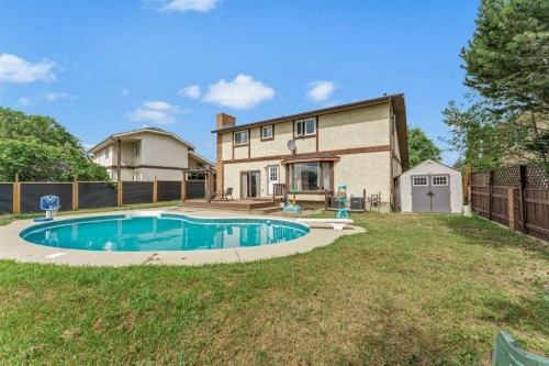 45 Cooper Road Se, Medicine Hat, AB - Outdoor With In Ground Pool With Deck Patio Veranda With Backyard