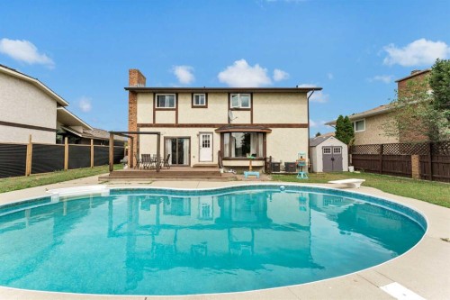 45 Cooper Road Se, Medicine Hat, AB - Outdoor With In Ground Pool With Deck Patio Veranda With Backyard